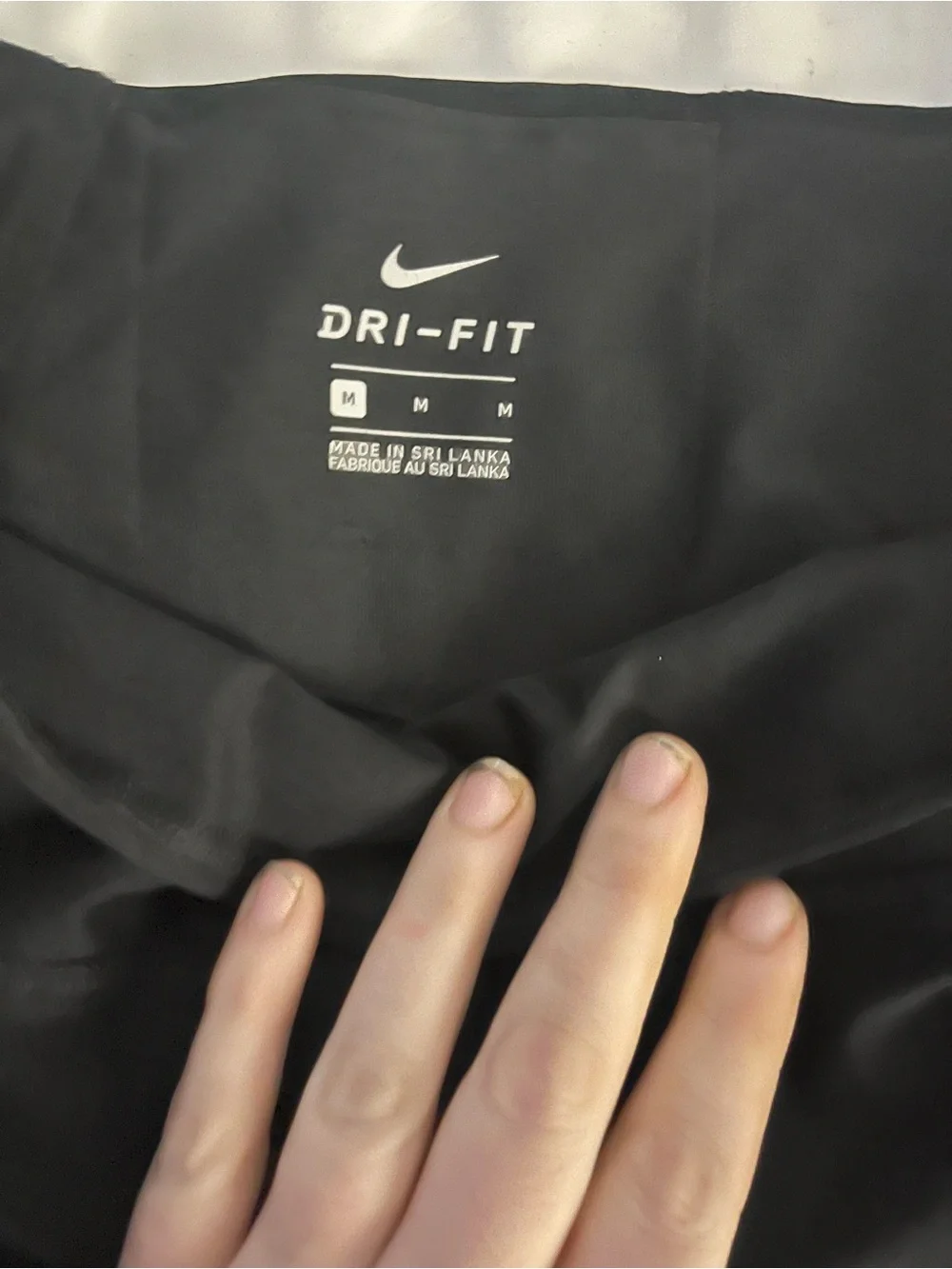 Nike Kids Black Leggings with White Swoosh